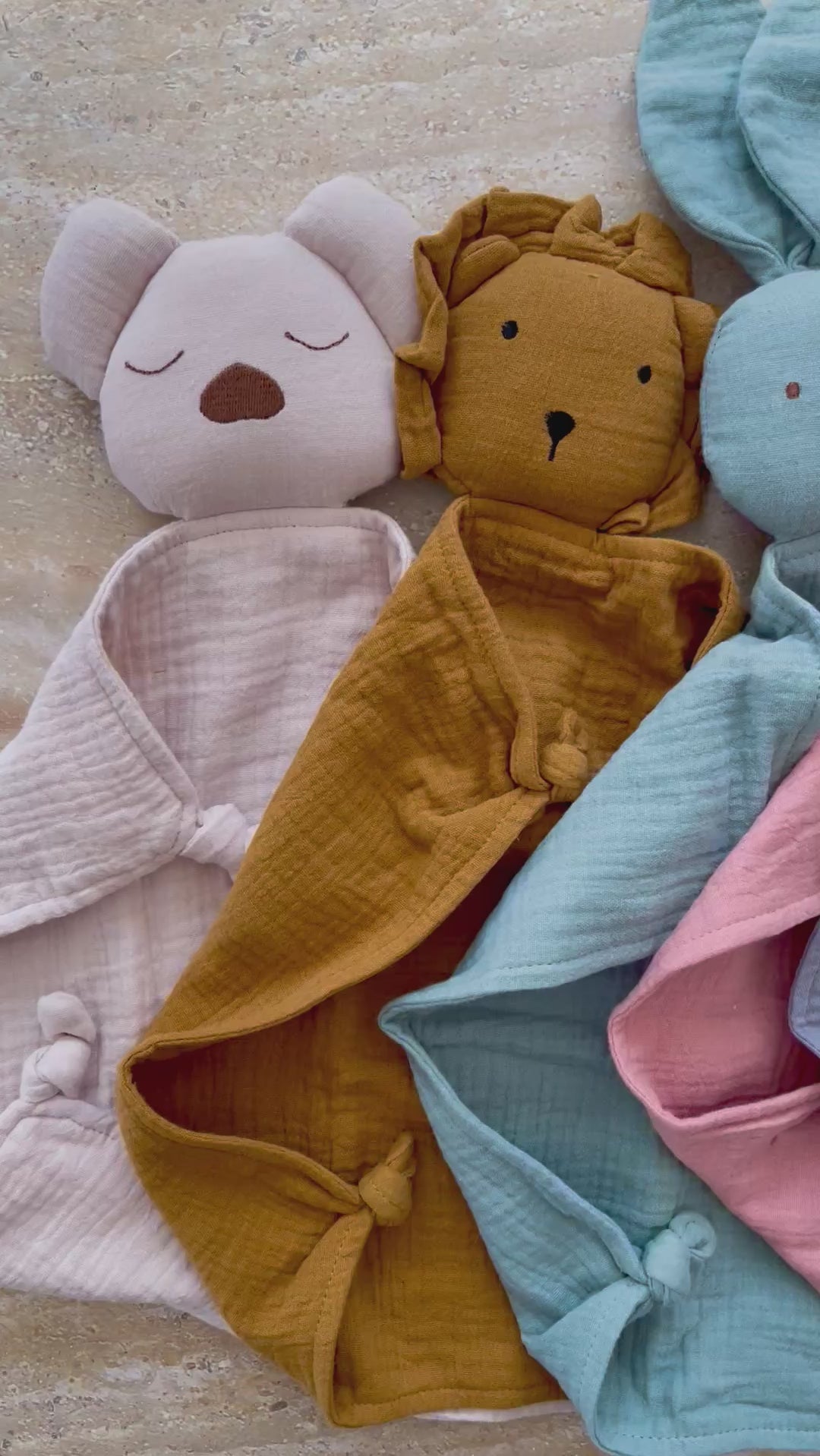 Reel of Tutyi & Sisu organic cotton baby & toddler koala, lion, bunny, bear comforter, lovey, security blanket