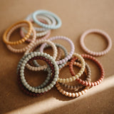Mushie Silicone Pearl Teether Bracelets Clary Sage/Tuscany/Desert Sand